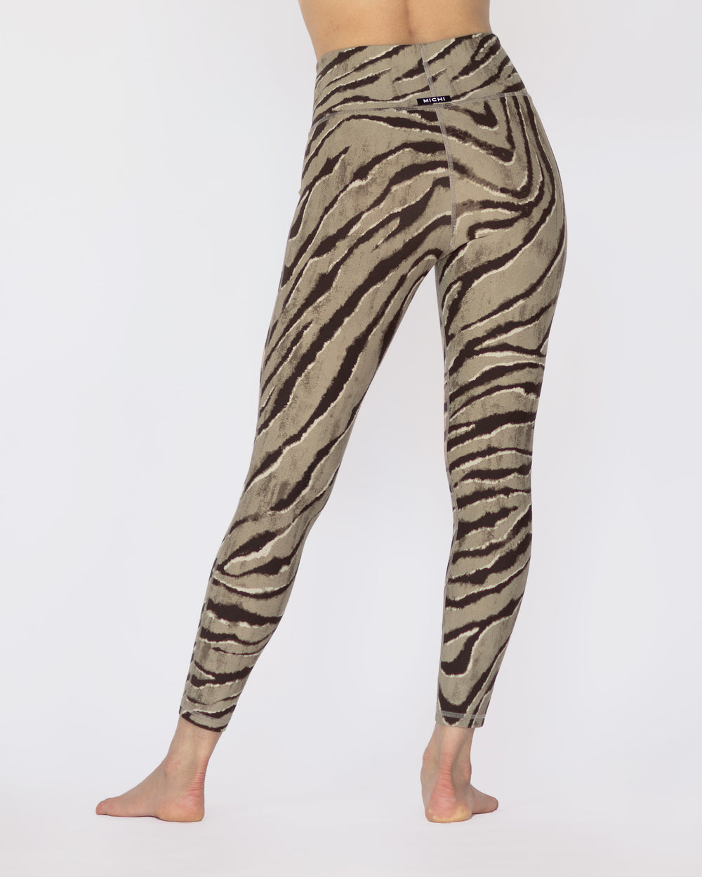 Shop the MICHI Instinct Tiger Print Legging | Women's Designer Activewear